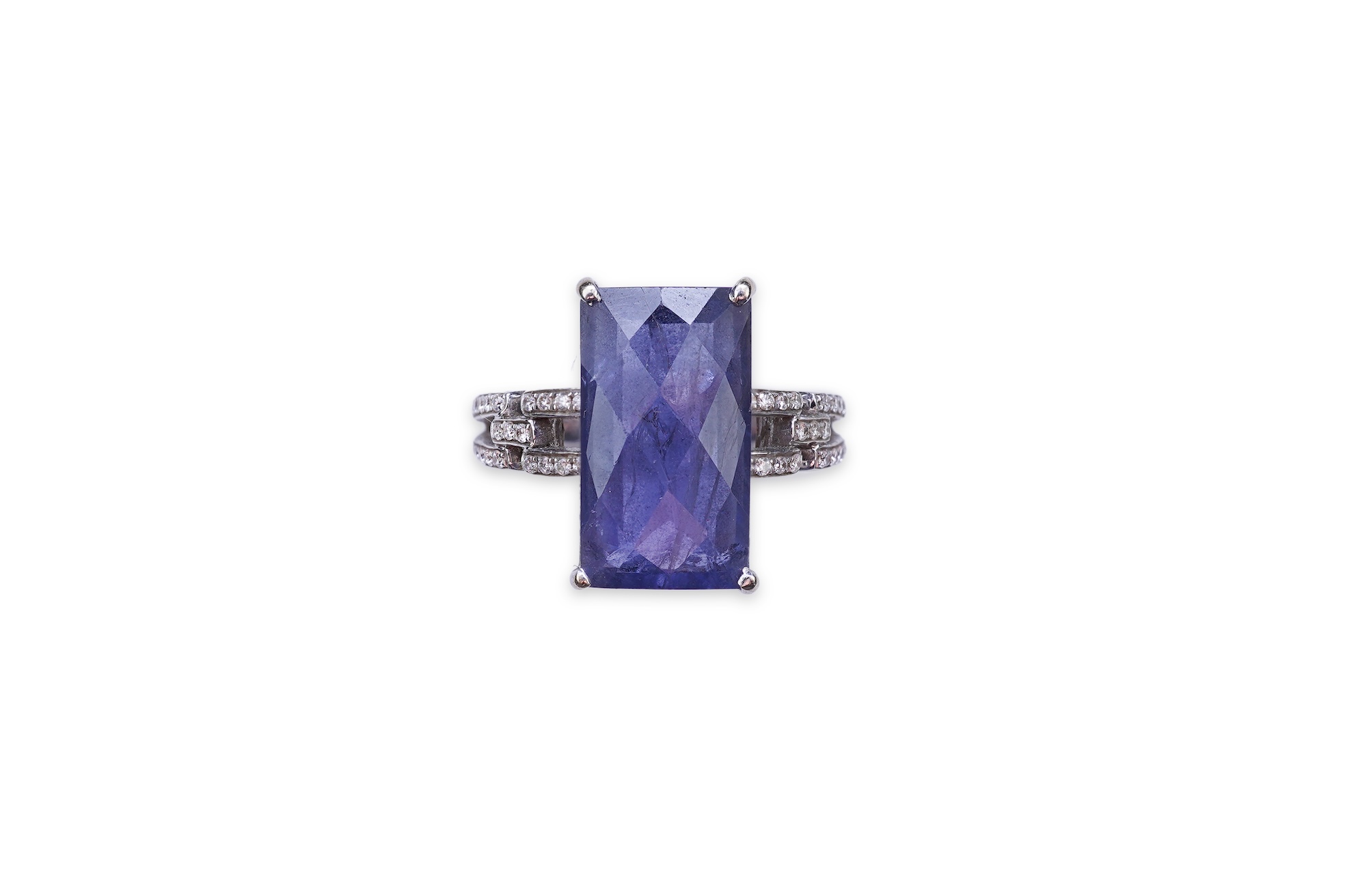 An iolite and diamond ring